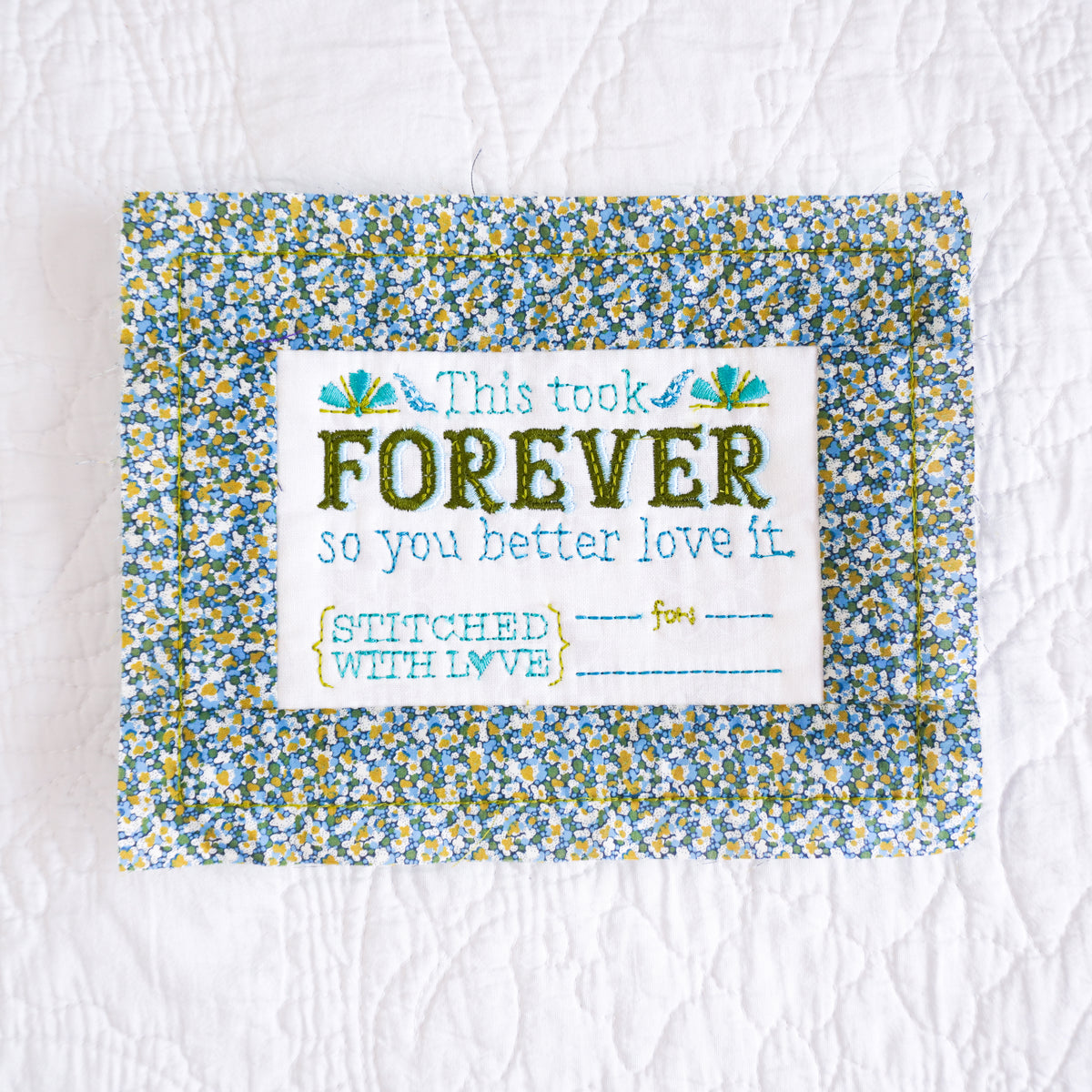machine embroidery: in-the-hoop framed quilt labels