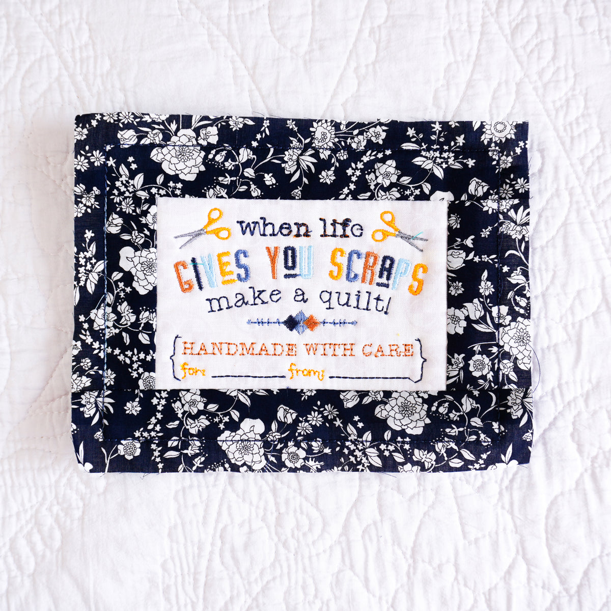 machine embroidery: in-the-hoop framed quilt labels
