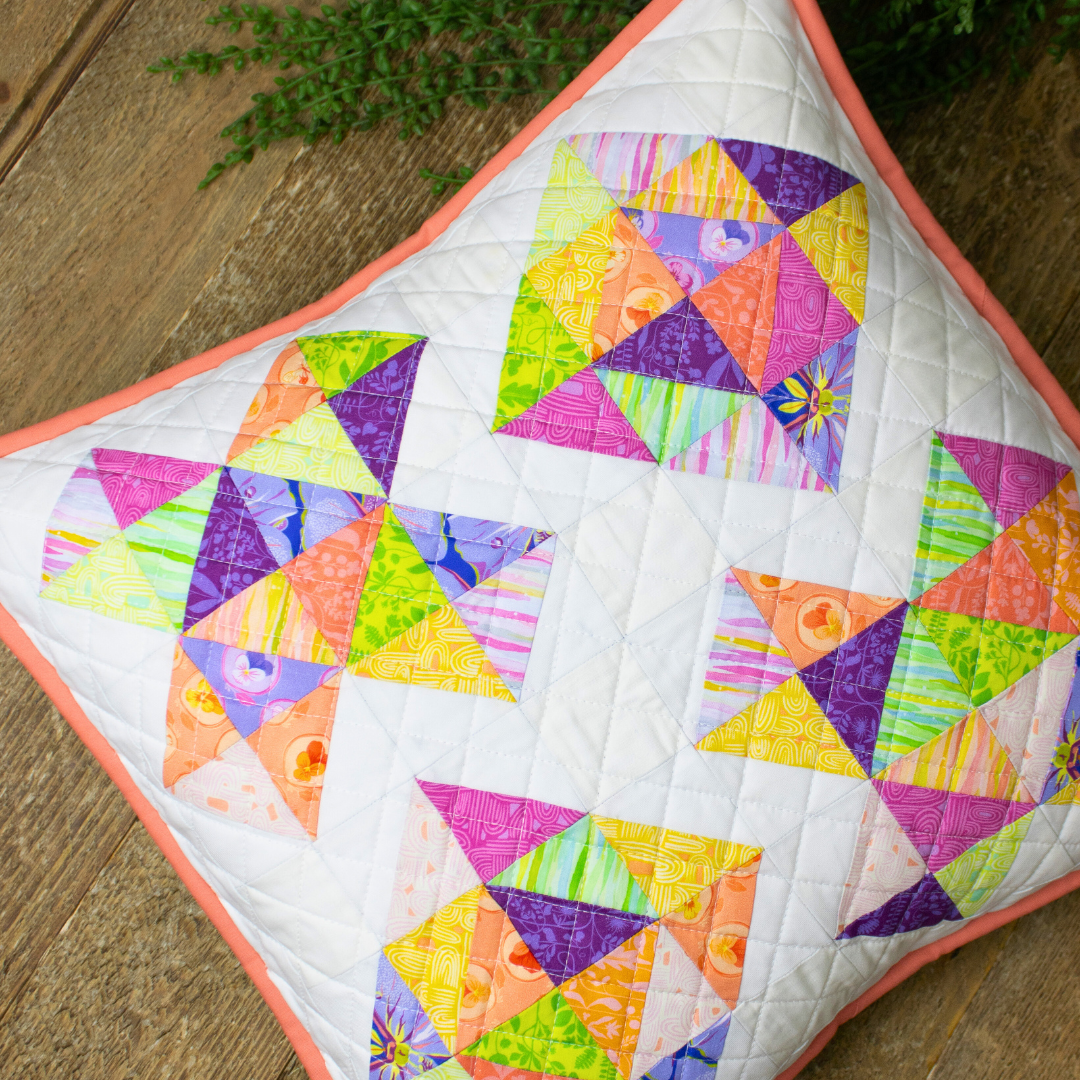 'love you more' quilted pillow