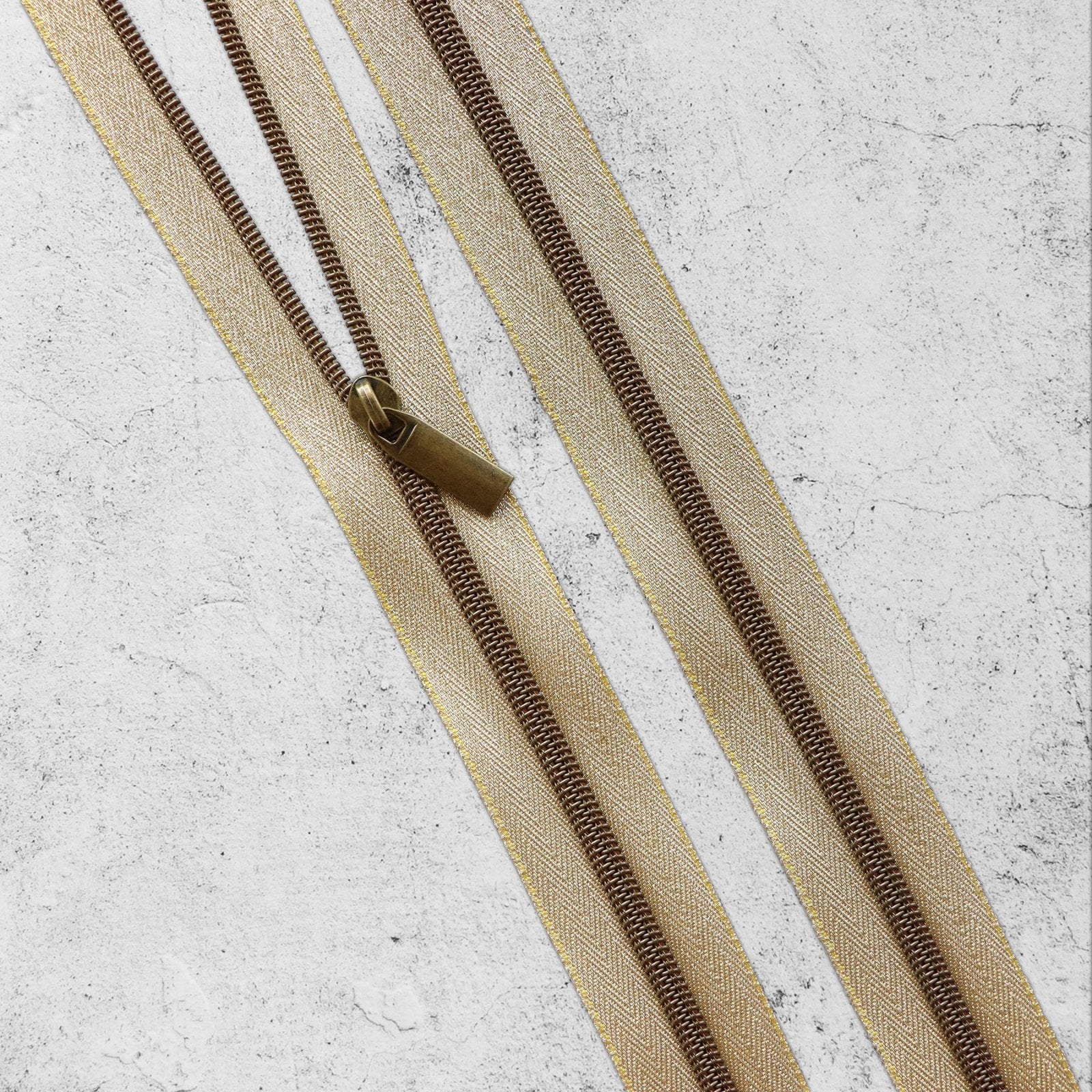 Sallie Tomato -  #5 Nylon Zipper By the Yard - Gold/Antique Brass