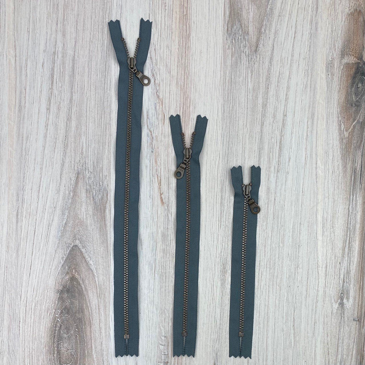 YKK Metal Zipper - Cranberry with Antique Brass Donut Pull 